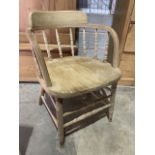 A pine bent wood open arm chair with wide seat spindle back and turned legs. Seat height H:45cm