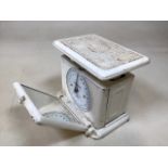A 1920s pair of painted cast iron bathroom scales with drop down mirror W:25cm x D:16cm x H:21cm