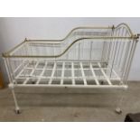 A Victorian brass and iron cot bed. W:140cm x D:75cm x H:111cm