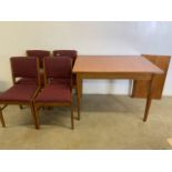 A Gordon Russell mid century extending teak table and four chairs with labels to table and chairs.