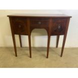 A small Edwardian inlaid knee hole desk with central drawer flanked by drawer and cupboard. W: