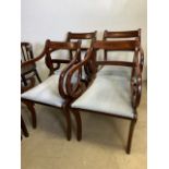 Four reproduction inlaid sabre leg and scroll arm dining chairs. Seat height H:46cm