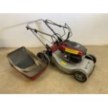 A Honda Mountfield lawnmower SP53H with grass box.