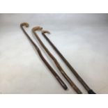 Three wooden shepherds crooks H:135cm Height of longestb