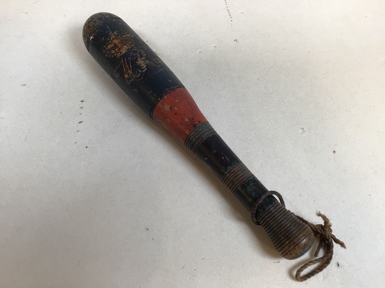 A hand painted truncheon with crown and monogram WR. Possibly William IV. Original red and blue