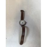 A WW1 Trench style silver wrist watch with screw back case. 3.4 mm diameter not including winder.