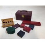 A jewellery box with handle, a few items of costu,e jewellery, some empty ring boxes and a set of