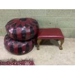 Two leather poufes also with a leather topped footstool.