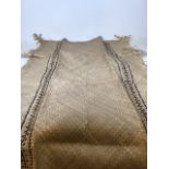 A tribal hand woven mat. W:115cm x H: 190cm