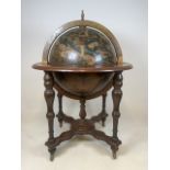 A Large vintage spinning bar globe with lift up lid to interior bar. On castors. Approx H:100cm