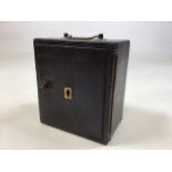 A leather bound travel safe with four drawers labelled gold, silver,notes and keys W:16cm x D:10cm x