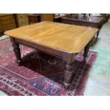 A mahogany extending table with extra leaf. W:122cm x D:135cm x H:75cm Extra leafW:46cm