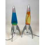 A pair of Mathmos Telstar lava lamps. Oil bottles slightly different shapes H:49cm