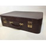 A vintage Pukka luggage suit case with key Circa 1940s W:53cm x D:35.5cm x H:16cm