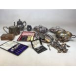 A quantity of silver plated items including boxed and loose cutlery, serving dishes and other items
