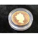 A Queen Elizabeth II Alderney 2019 gold quarter sovereign coin in capsule