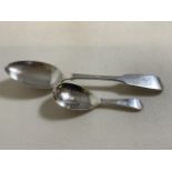 A silver caddy spoon also with a silver desert spoon. 69 grams.