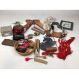 A collection of oriental items including fans, tassels, paint brushes, hair combs and accessories,