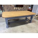 A Modern solid oak topped coffee table with painted base. W:120cm x D:55cm x H:42cm