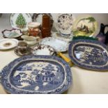 A quantity of ceramics including meat platters, plates, vases and other items