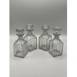 A set of 4 French glass square spirit decanters with octagonal stoppers. In the 'Baccarat