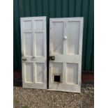 Two painted wooden doors both with brass handles and working keys one with aperture for cats. W:85cm