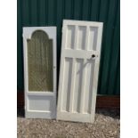 A decorative painted door with wire and material insert also with another door with a working key.