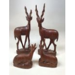 Two pairs of East African carvings of Kudu (antelope) - some damage to horns. Uganda, circa 1960.