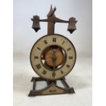 A Buco Swiss Baumann ltd tick tock wooden mantle clock.