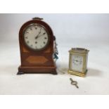 A inlaid mahogany cased mantle clock in as found condition also with a small carriage clock W:18cm x