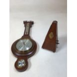 A Comitti of London banjo barometer, a metronome Maelzel W:20cm x H:59cm Barometer