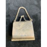 A small silver novelty handbag with hall marks.