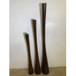 Three decorative graduated wooden turned stands. Tallest H:150cm