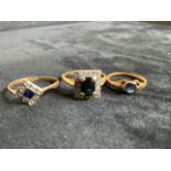 Three 9ct gold rings. Two sapphire and illusion set diamond rings and one other.