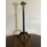 A turned mahogany tripod base with later brass top. H:88cm