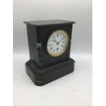 Heavy marble mantle clock. AF, untested. Pendulum present, no winding key. W:21.5cm x D:12.5cm x H: