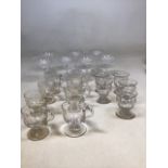 A quantity of nineteenth century and later custard glasses also with champagne coupes