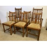 Six light oak dining chairs (not a matching set) the two carvers with rope twist and carved