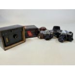 A Pentax Ashai Spotmatic camera also with a Ziess Ikon Contaflex camera also with an Essex 35mm