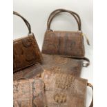 A group of 6 various North Sudanese crocodile skin handbags. A/F.