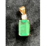 A square cut Emerald/tourmaline and diamond pendant set in yellow coloured metal W: 7mm x H:1.1cm