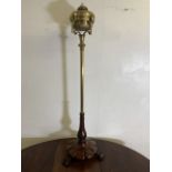 A Victorian mahogany tripod base with brass column oil lamp. H:120cm
