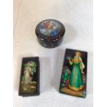 Two Russian lacquered boxes decorated with mystical women and a Ceramic music al trinket box