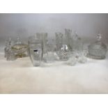 A quantity of glass and crystal vases and lidded pots including a Marquis Waterford crystal vase