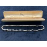 A string of pearls with sterling silver clasp in Ciro of Bond Street box. 45cm Length