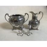 Silver plated jug and two handled bowl also with two place name holders.