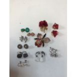 Costume jewellery 9 pairs of ear rings and 2 brooches. A Cerrito enamelled flower brooch and a