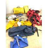 A lifeguard four man inflatable life raft, rescue sling, eight crew fit air only life jackets etc.