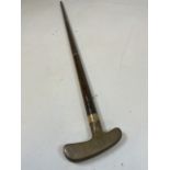 An early 20th century sectional walking stick with brass handle. H:87cm
