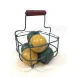 Vintage wire basket with painted wooden balls. In fair to good used condition.